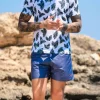 Costume da Bagno blu abbinato a Polo Tropical