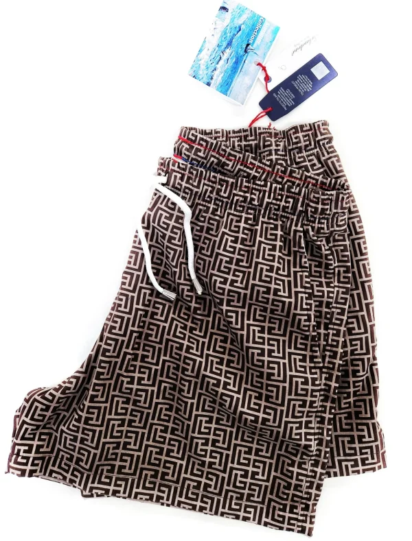 Costume da Bagno fantasia Geometrica slip interno  morbido tessuto asciugatura rapida Boxer mare uomo fantasia Geometrica con 2 tasche laterali Made in Italy