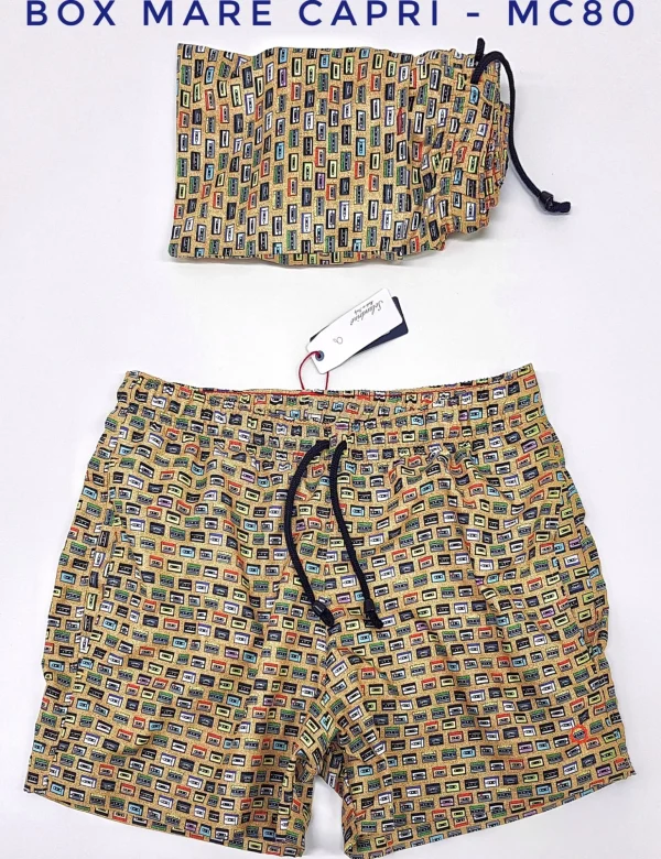 Costume da Bagno Giallo Fantasia Musicassetta abbinato a Tshirt Nera fantasia fashion is a rebus